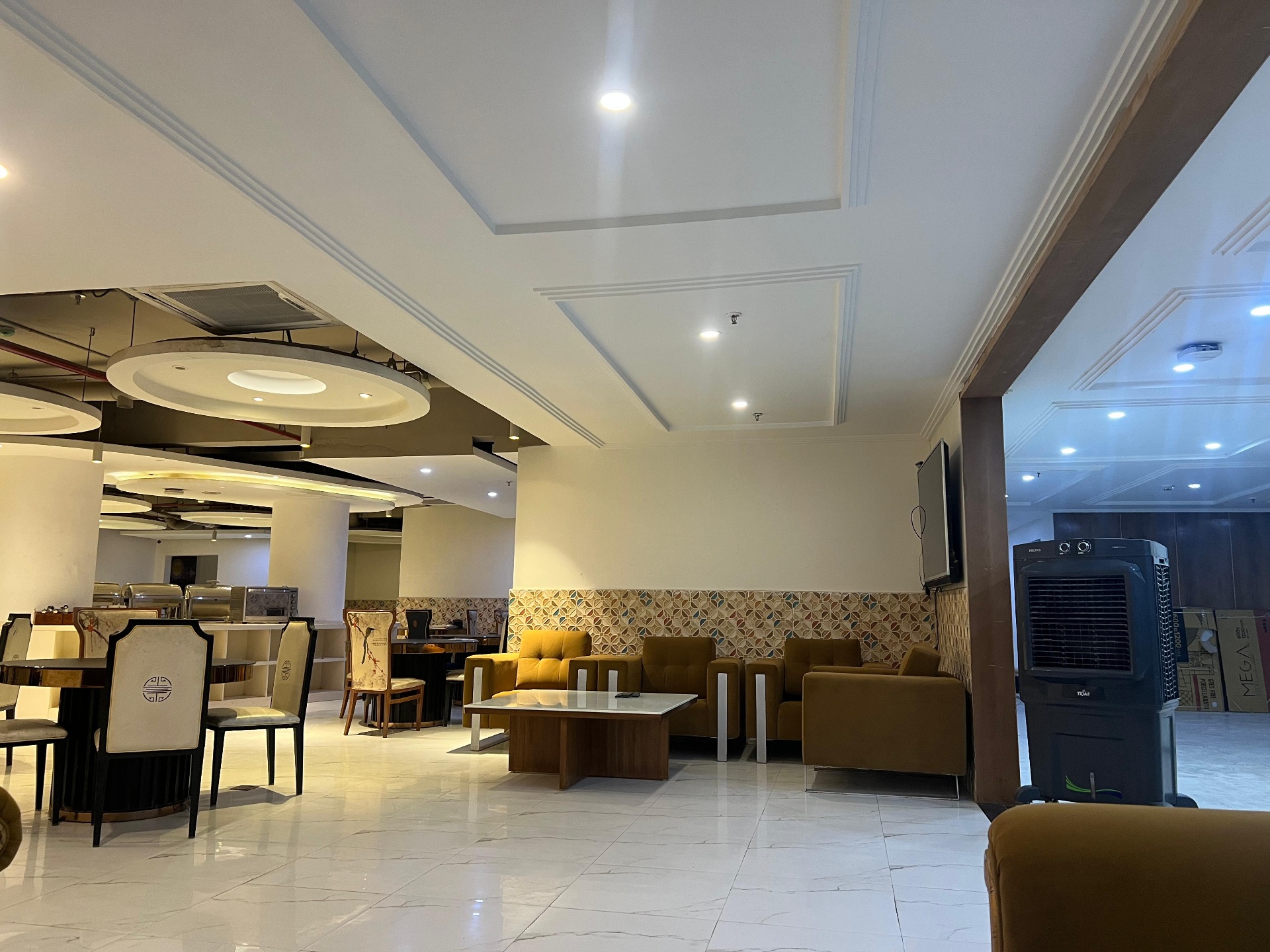 Lounge and dining area at Nestro Housing PG near DLF Cyber City